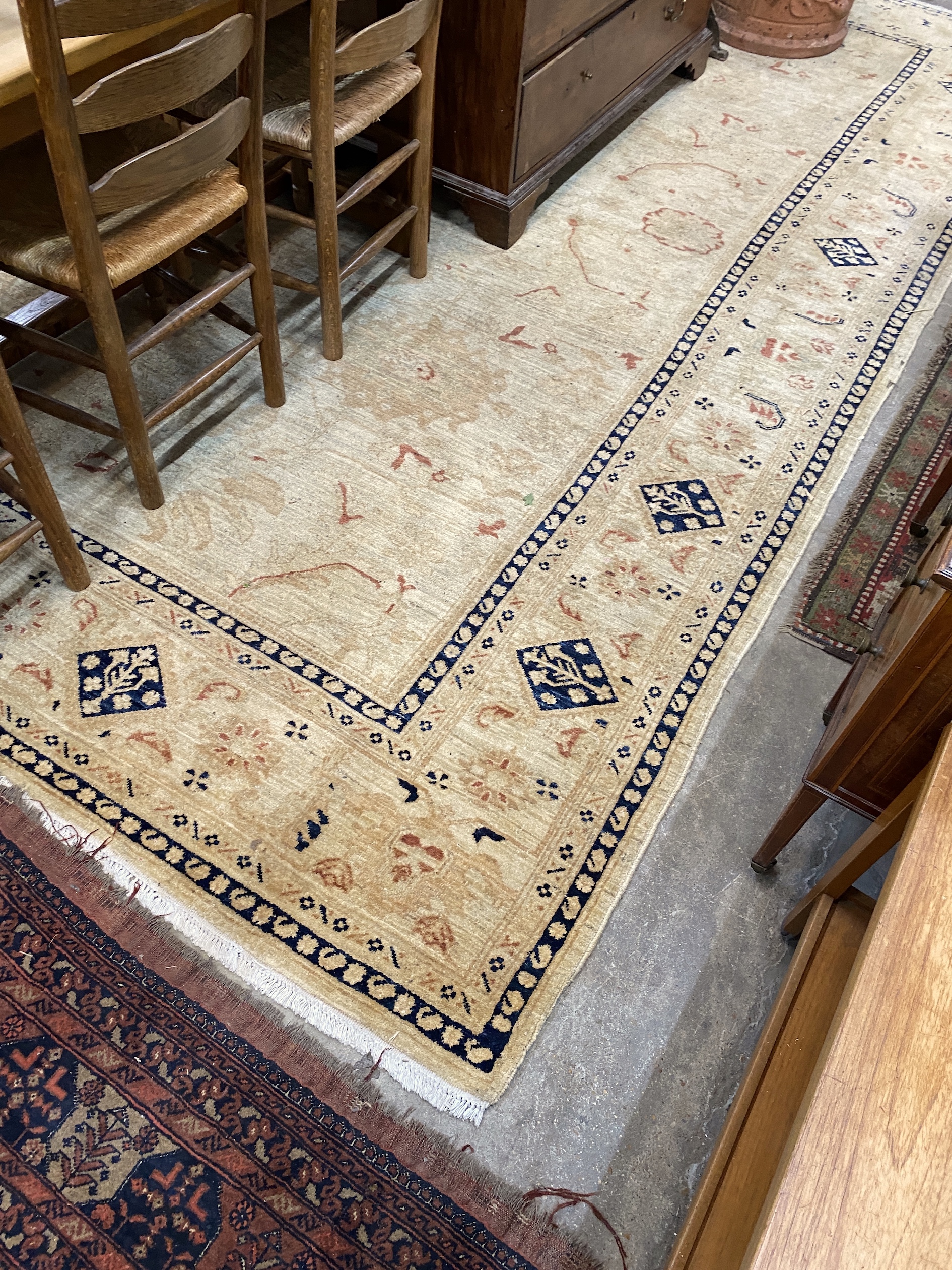 A Ziegler style gold ground floral carpet, 390 x 288cm